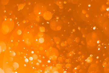 Orange abstract circle bokeh background