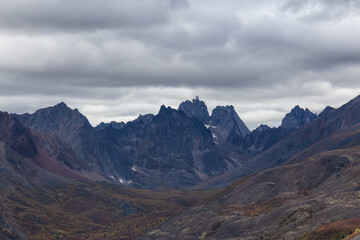 Fototapeta na wymiar Beautiful View of Scenic Mountains and Landscape during the Fall Season in Canadian Nature. Taken in Tombstone Territorial Park, Yukon, Canada.