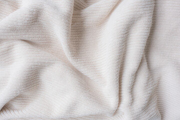 Full frame closeup of beige towel with soft filter effect - background concept