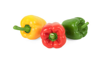 Red, green and yellow bell peppers isolated on white background.