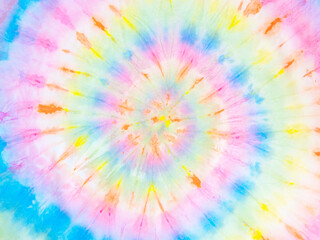 Rainbow tie-dye wallpaper. Hippie spiral tie bye background. Colorful burst.  - 386553668