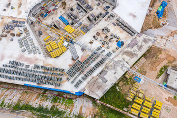 urban construction site with crane and building. industrial construction site background. aerial view