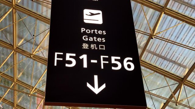 Sign of an airport terminal showing the gates.
