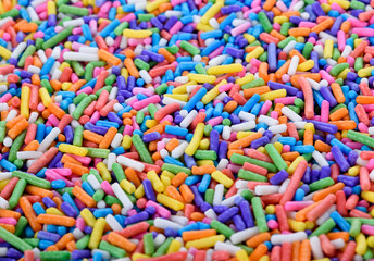 Fototapeta na wymiar Colorful sugar sprinkle decoration for cake and bakery.