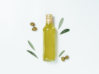 Olive oil glass bottle mock up. Top view of clear glass bottle with olive oil on white background...