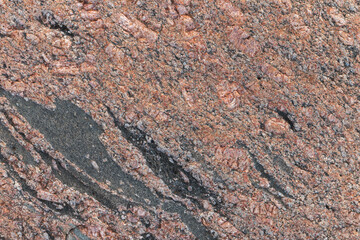 Natural red gray granite stone surface, background
