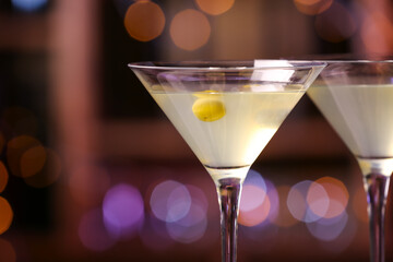 Glasses of fresh martini in pub, closeup
