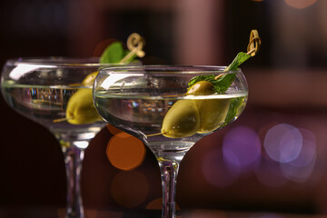 Glasses of fresh martini in pub, closeup