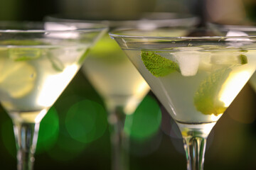 Glasses of fresh martini in pub, closeup