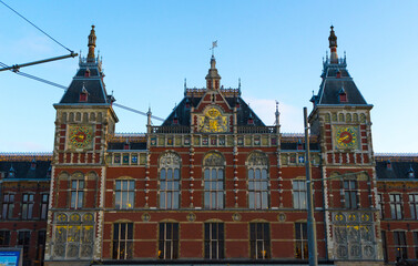 Fototapeta na wymiar Amsterdam Central station against the blue sky.