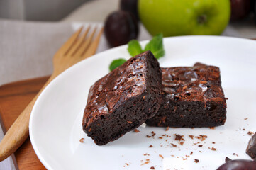 Two Pieces of Fudge Brownies on White Plate