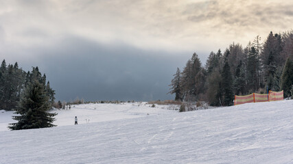 Dark clouds over ski slope in Beski Sadecki mountains
