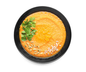 Tasty pumpkin cream soup in bowl on white background