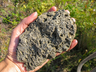 hand holding a stone