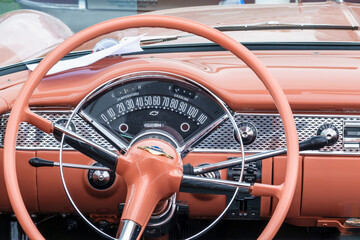 Steering wheel and speedometer in an old Chevrolet, bel air