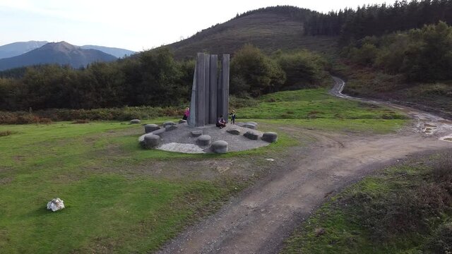 yoshin ogata sculpture in the mountains in the basque country, spain (aerial shot made with drone)