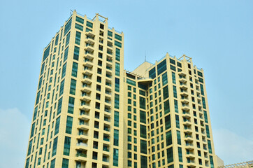 Modern apartment building in the city with blue sky