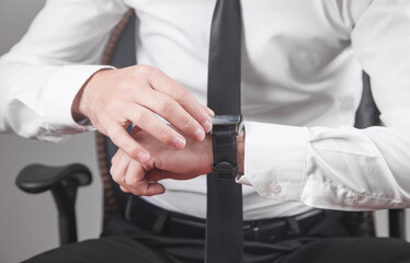 Businessman wearing luxury wristwatch. Fashion, Lifestyle
