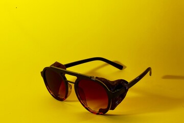 fashion glasses, on a yellow background