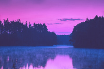 Magical pink sunset over the lake. Serene lake in the evening. Nature landscape - Powered by Adobe