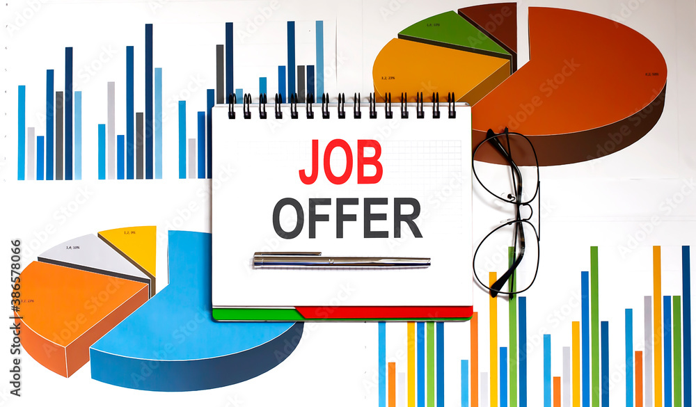 Poster job offer text on the notepad on chart background with pen and glasses