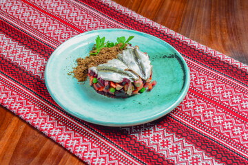 Traditional russian salad with salted herring and beet -Dressed Herring. Russian and Ukrainian cuisine concept.