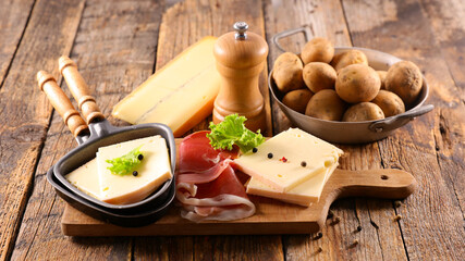 raclette cheese with meat and potato