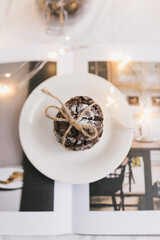 Christmas chocolate chip cookie with lights on white background