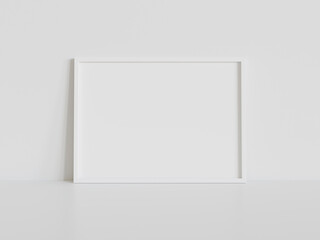 White frame leaning on white floor in interior mockup. Template of a picture framed on a wall 3D rendering