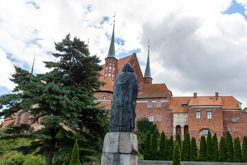  Monument to Nicolaus Copernicus and fragment of a cathedral  hill in Frombork. Poland