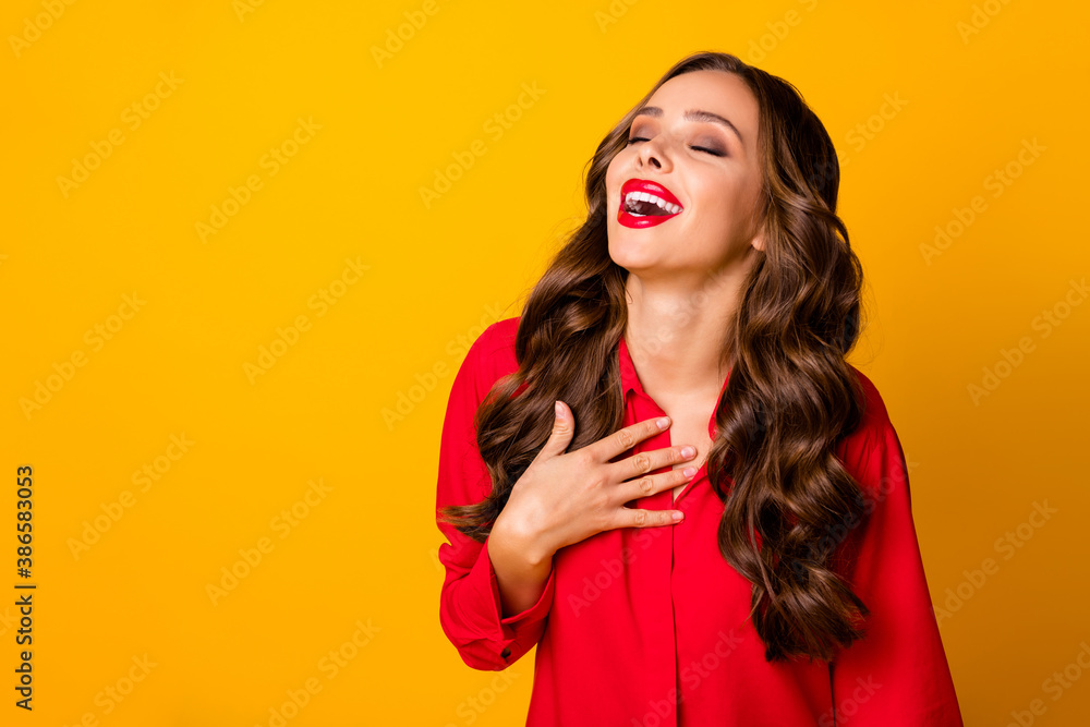 Sticker Photo of crazy attractive wavy lady shine glossy lipstick eyes closed arm on chest laughing out loud wear red office shirt isolated bright vivid yellow color background