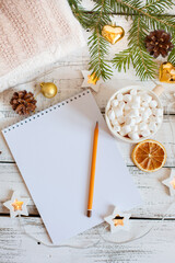 Christmas background, Notepad with pencil, coffee mug and marshmallows , Golden Christmas tree toys . Letter To Santa Claus. Merry Christmas greeting card
