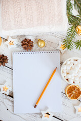 Christmas background, Notepad with pencil, coffee mug and marshmallows , Golden Christmas tree toys . Letter To Santa Claus. Merry Christmas greeting card