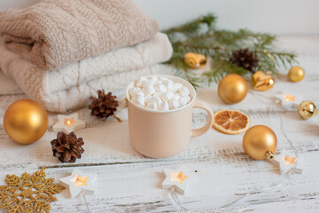 Obraz na płótnie Canvas Christmas background , coffee mug and marshmallows , Golden Christmas tree toys . Merry Christmas greeting card