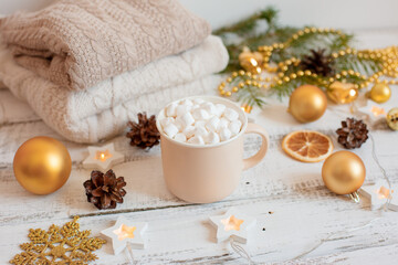 Christmas background , coffee mug and marshmallows , Golden Christmas tree toys .  Merry Christmas...