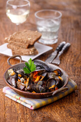 mussels on dark wood