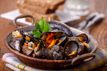 mussels on dark wood