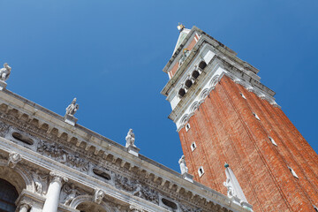 Close view of St Mark's Campanile and Palazzo Ducale at Piazzetta San Marco in Venice, Italy.
