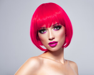 Beautiful young fashion woman with pink lipstick. Glamour fashion model with bright make-up, at...