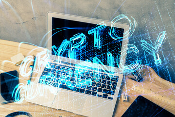 Double exposure of blockchain theme hologram and table with computer background. Concept of bitcoin...