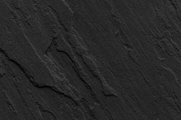Dark grey black slate background or texture. Black granite slabs background