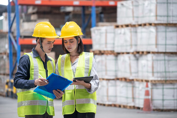 Warehouse worker working together in warehouse