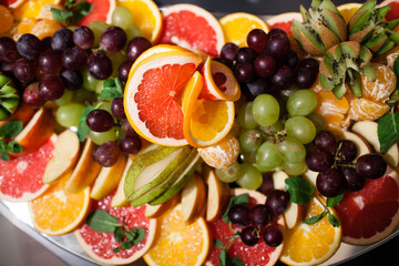 Naklejka na ściany i meble Fruit bowl with many different fruits