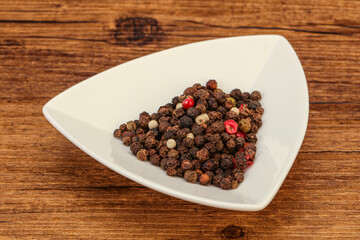 Peppercorn heap in the bowl