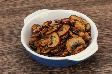 Roasted champignon with herbs and spices