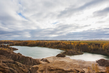 Quarry at Romantsevo (village Konduki). Russia. Autumn landscape
