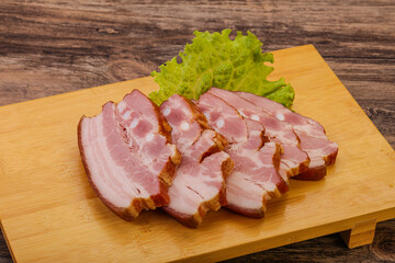 Tasty smoked pork brisket slice