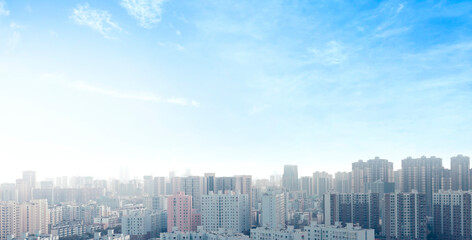 World Cities Day concept:  real estate modern city urban skyline under blue sky 