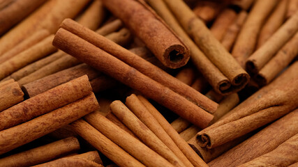 heap of cinnamon stick top view, close up