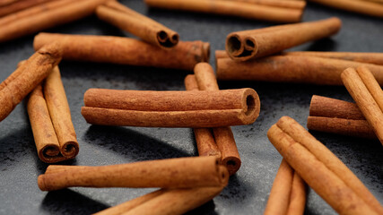 heap of cinnamon stick top view, close up